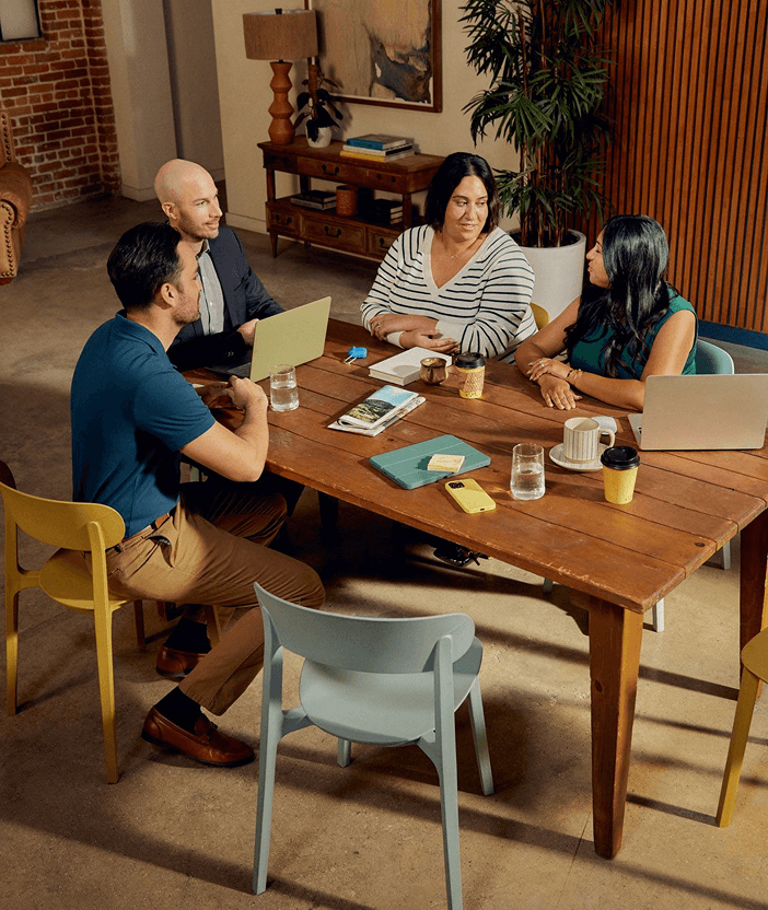 Musemind team collaborating around a table